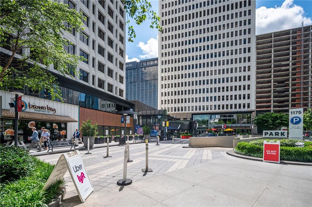 145 15th Street Northeast, Unit 1225 Atlanta, GA 30361 - Photo 45 of 54 a sign board with building in the background