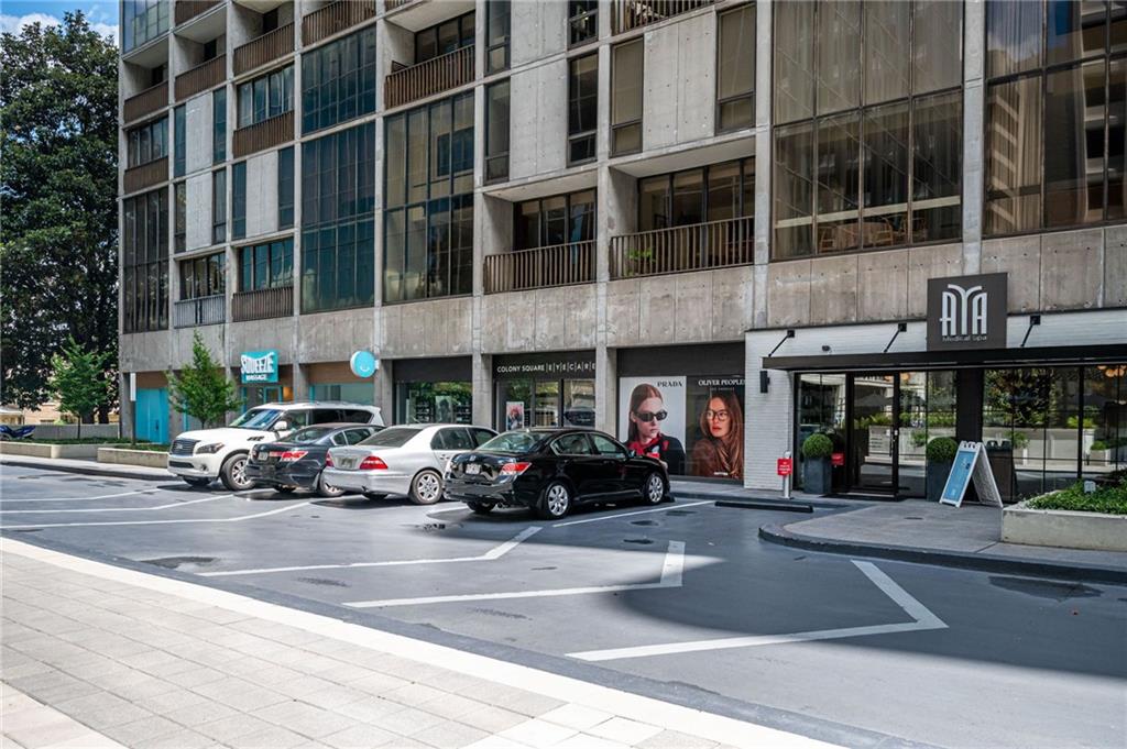 145 15th Street Northeast, Unit 1225 Atlanta, GA 30361 - Photo 50 of 54 a car parked in front of a building
