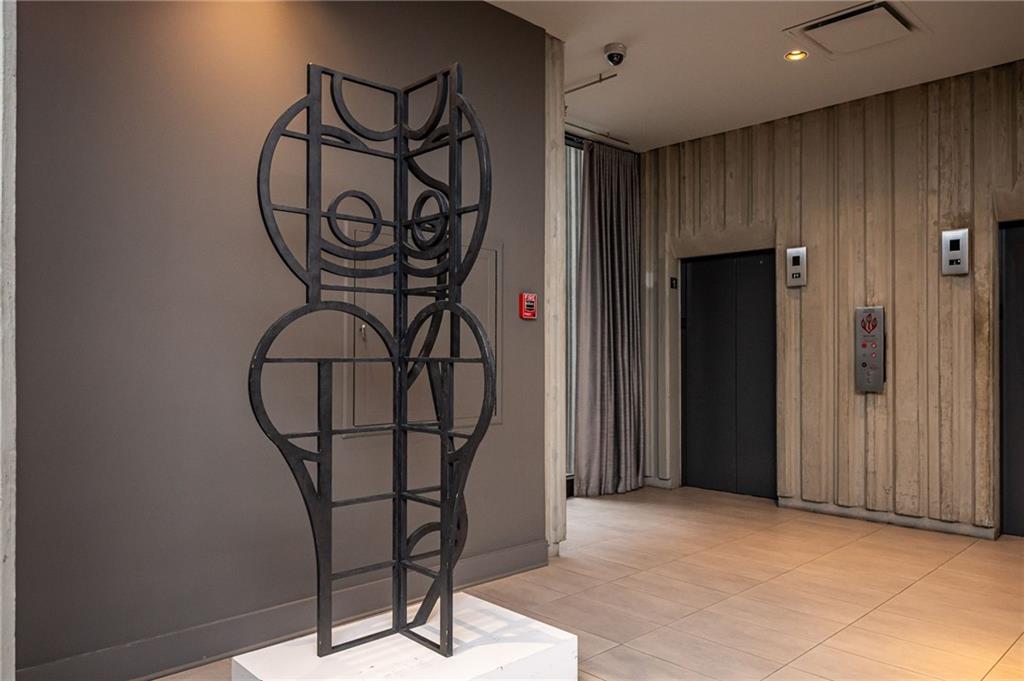 145 15th Street Northeast, Unit 1225 Atlanta, GA 30361 - Photo 53 of 54 a view of a room with gym equipment