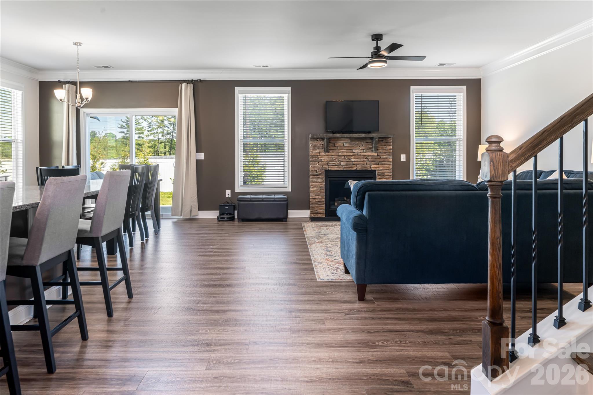 615 Fox Cove Road Hendersonville, NC 28792 - Photo 12 of 47 a living room with furniture and a flat screen tv