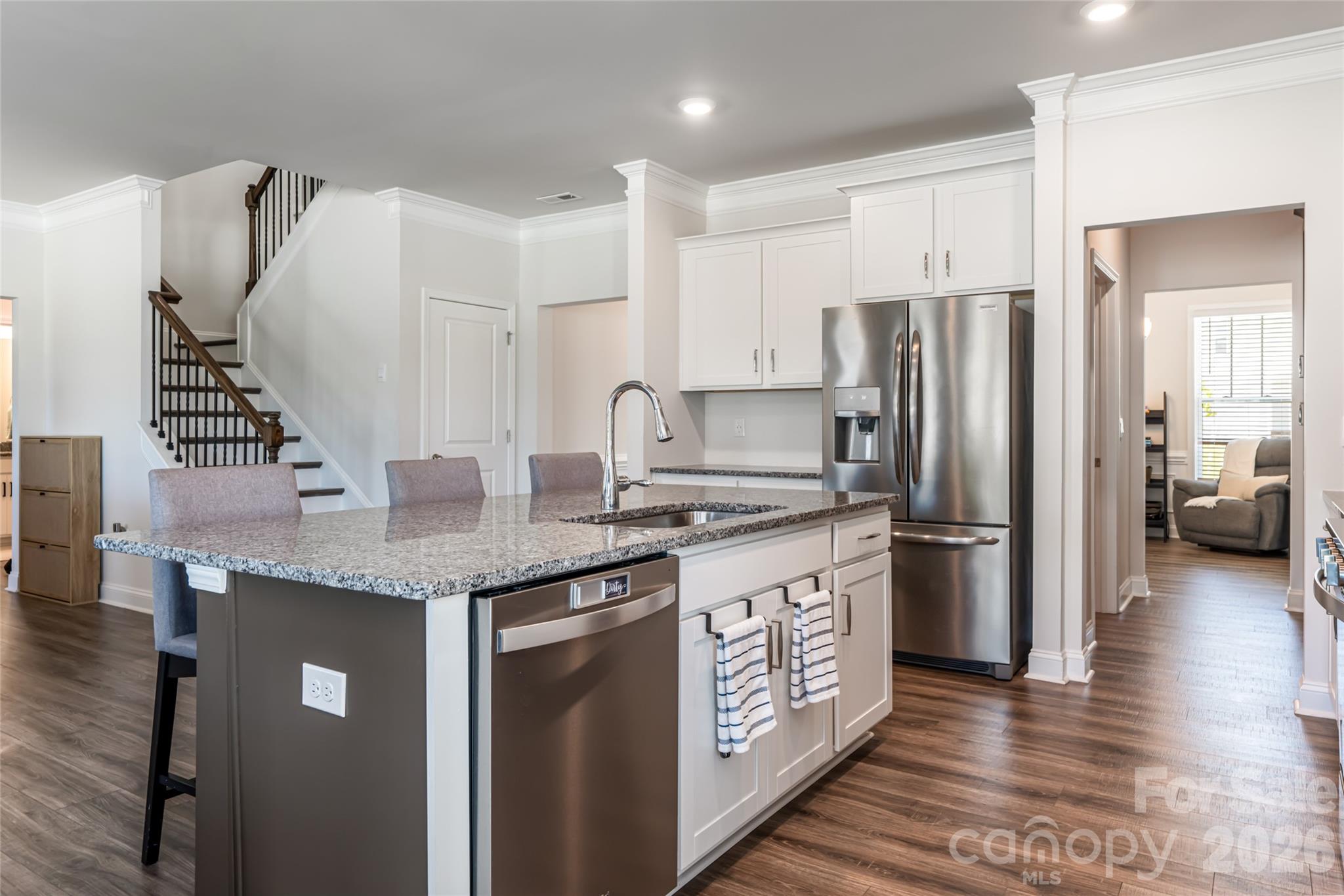 615 Fox Cove Road Hendersonville, NC 28792 - Photo 21 of 47 a kitchen with stainless steel appliances granite countertop a refrigerator a stove and a sink