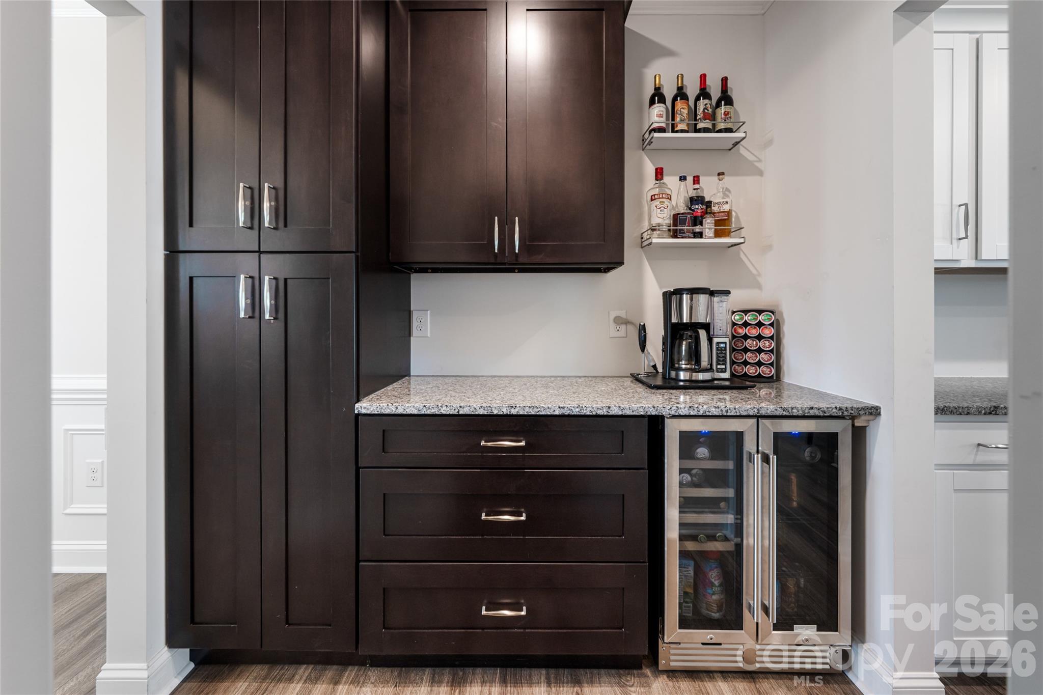 615 Fox Cove Road Hendersonville, NC 28792 - Photo 22 of 47 a kitchen with stainless steel appliances granite countertop a stove and a refrigerator with cabinets
