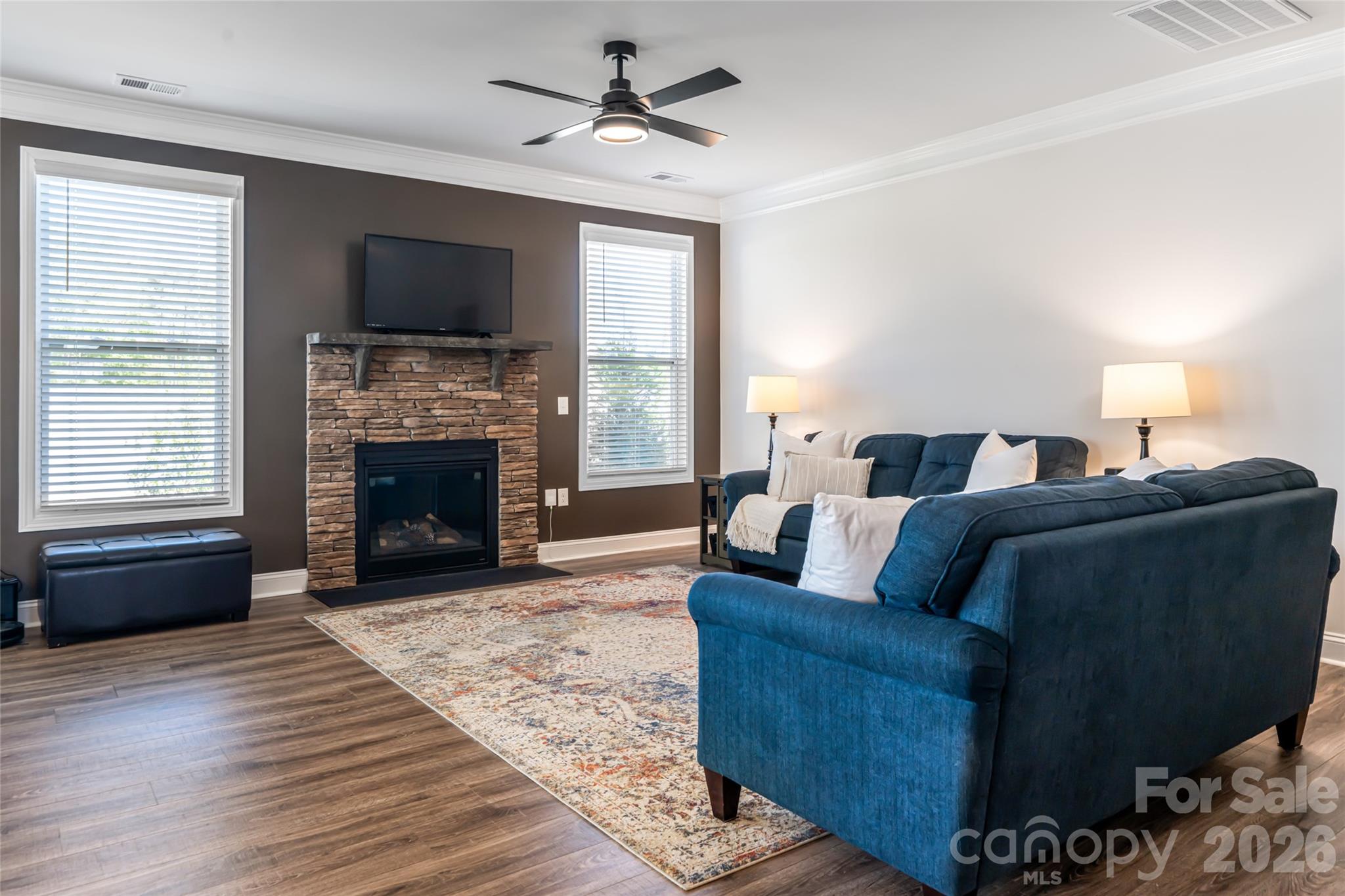 615 Fox Cove Road Hendersonville, NC 28792 - Photo 4 of 47 a living room with furniture and a fireplace or television