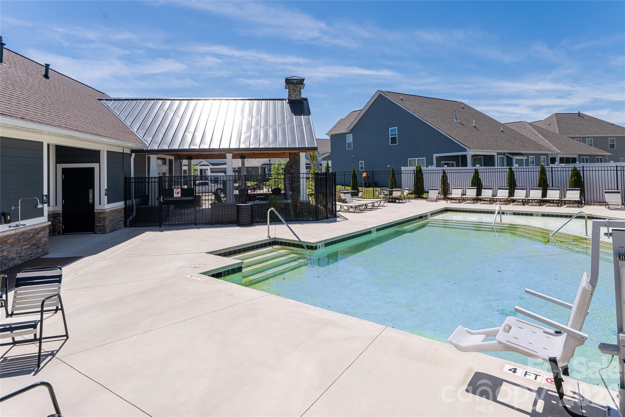 615 Fox Cove Road Hendersonville, NC 28792 - Photo 46 of 47 a view of a house with swimming pool and sitting area