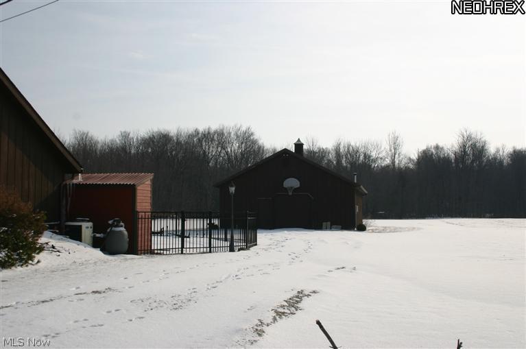 12180 New London Eastern Road Homerville, OH 44235 - Photo 11 of 17 Graveled drive goes all the way back to the barn.