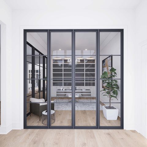 a view of staircase with a rug and a window