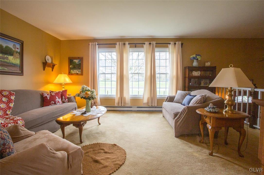 139 West Aluta Mill Road Nazareth, PA 18064 - Photo 2 of 28 a living room with furniture and a large window
