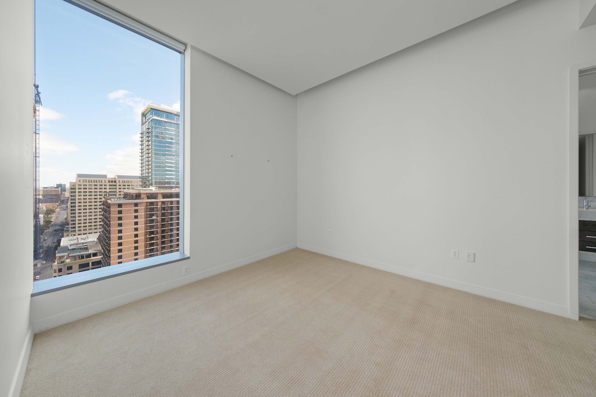 210 Lavaca Street, Unit 2608 Austin, TX 78701 - Photo 13 of 40 a view of an empty room with a window