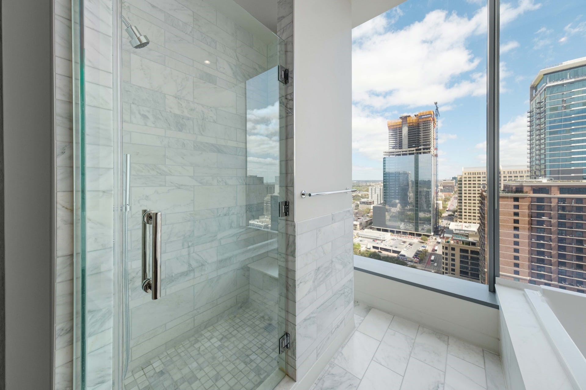 210 Lavaca Street, Unit 2608 Austin, TX 78701 - Photo 18 of 40 a bathroom with a shower and a sink