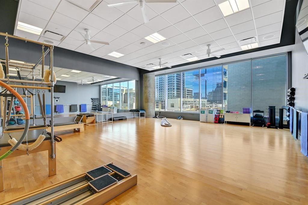210 Lavaca Street, Unit 2608 Austin, TX 78701 - Photo 36 of 40 a room with gym equipment and a large window