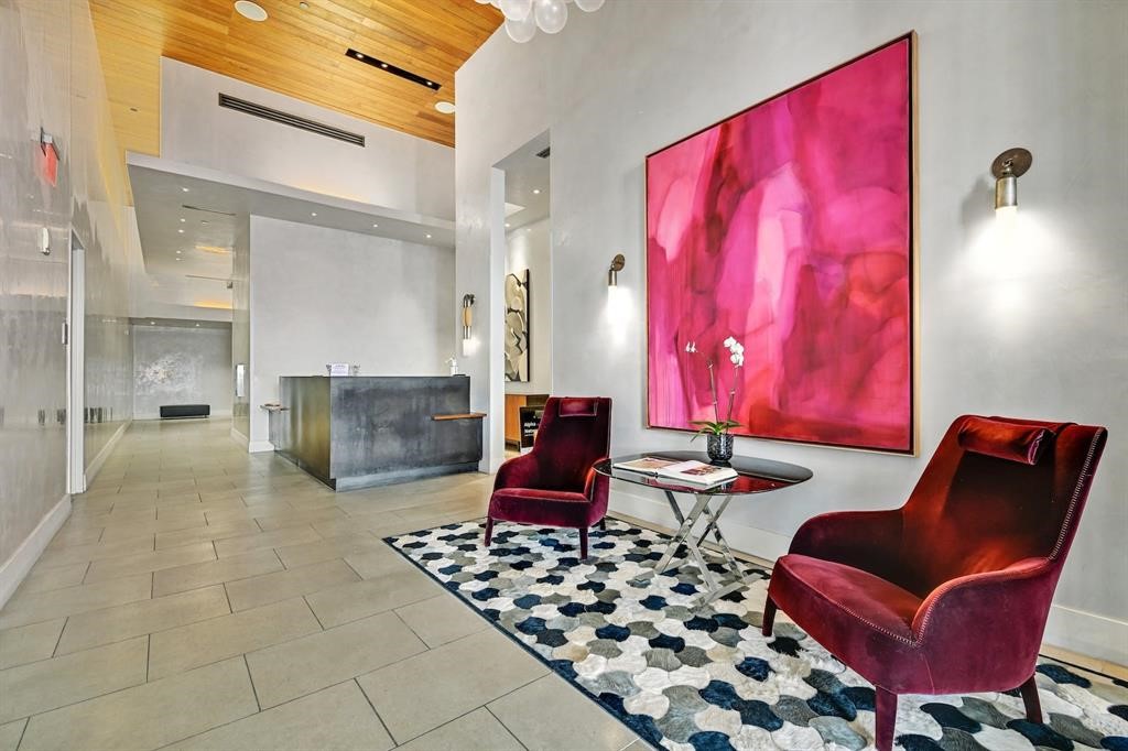 210 Lavaca Street, Unit 2608 Austin, TX 78701 - Photo 40 of 40 a living room with furniture and a fireplace