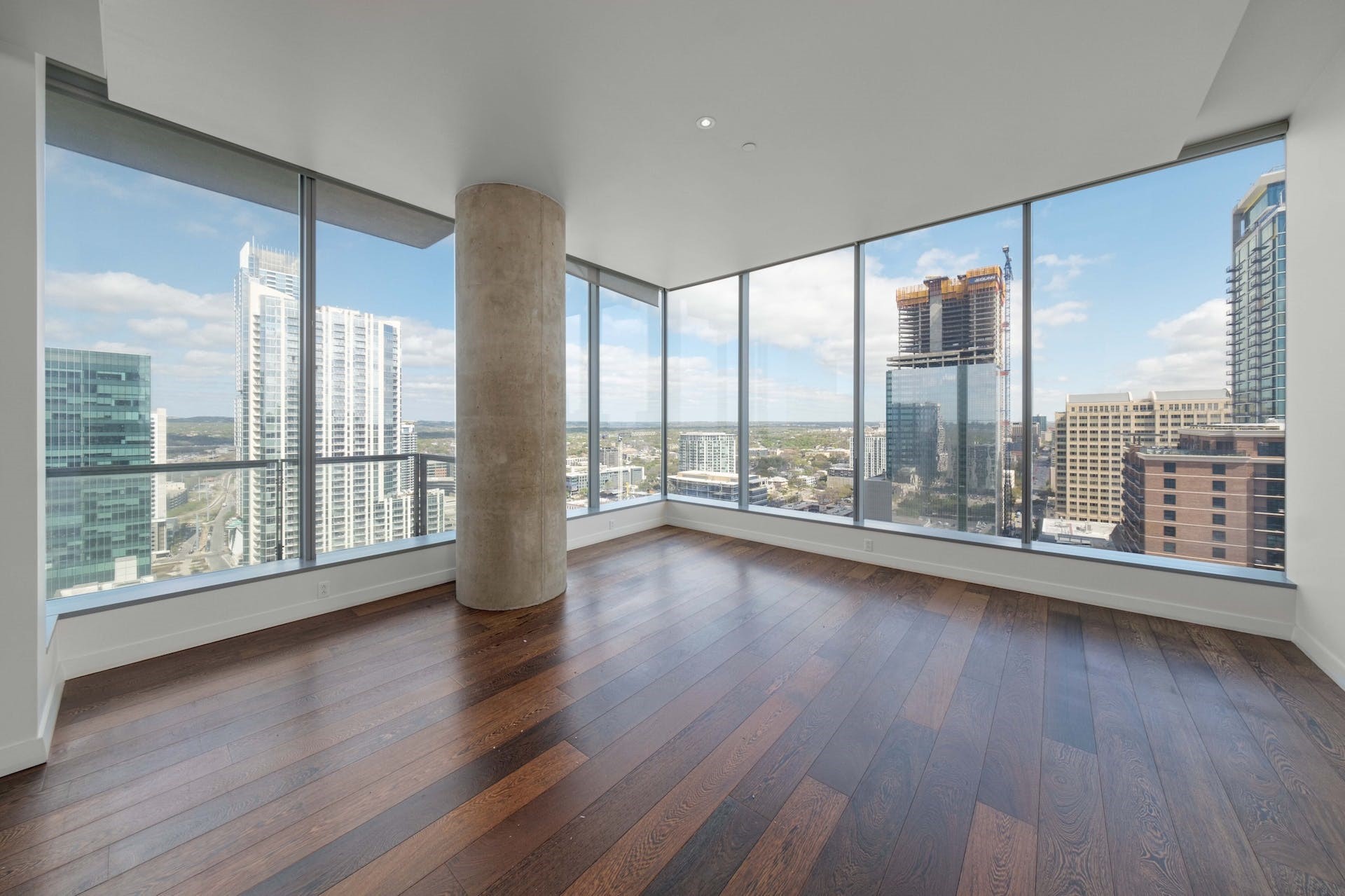 210 Lavaca Street, Unit 2608 Austin, TX 78701 - Photo 10 of 40 a view of empty room with wooden floor and floor to ceiling window