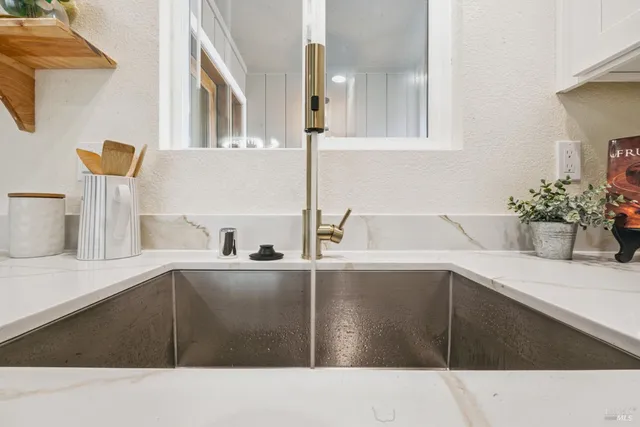 a view of a dining room kitchen and a sink