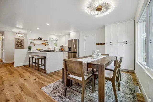 a bedroom with a bed and a table in it