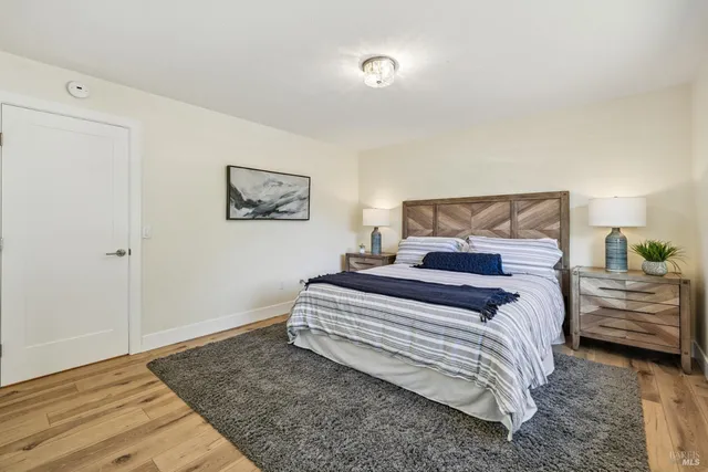 a white toilet sitting next to a bathroom