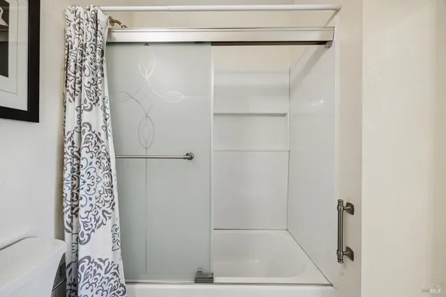 a aerial view of a house with a yard