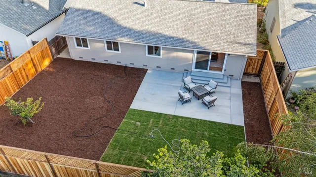a house view with a backyard space