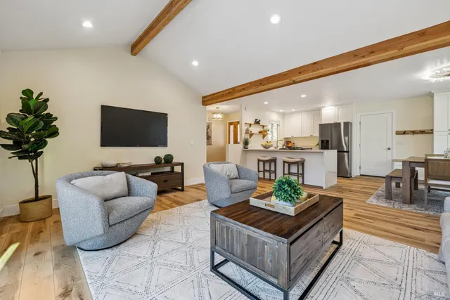 a kitchen with a sink stove and refrigerator