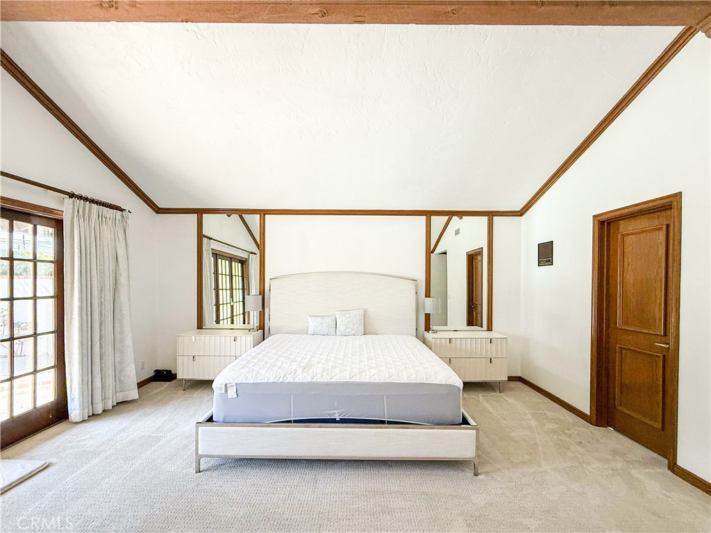 528 West Winnie Way Arcadia, CA 91007 - Photo 13 of 20 a spacious bedroom with a large bed and a window