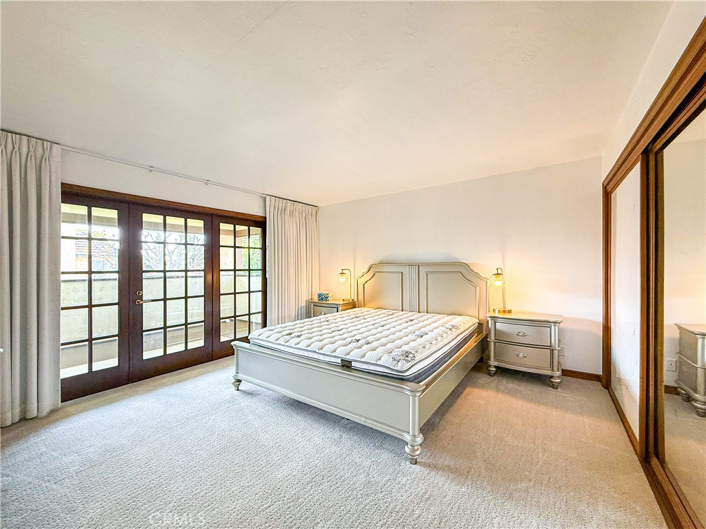 528 West Winnie Way Arcadia, CA 91007 - Photo 16 of 20 a spacious bedroom with a bed and a window