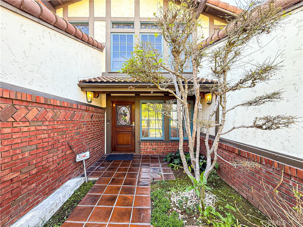 528 West Winnie Way Arcadia, CA 91007 - Photo 2 of 20 a view of a pathway with a house in the background