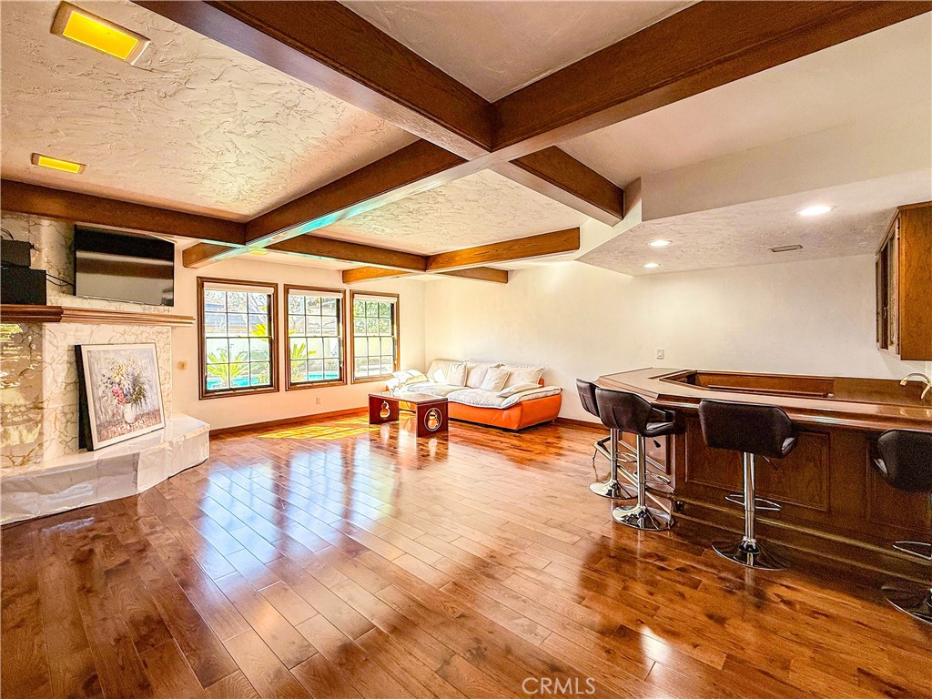 528 West Winnie Way Arcadia, CA 91007 - Photo 8 of 20 a living room with furniture a rug and a floor to ceiling window