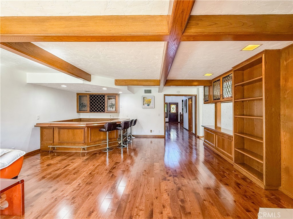 528 West Winnie Way Arcadia, CA 91007 - Photo 9 of 20 a room with wooden floor and furniture