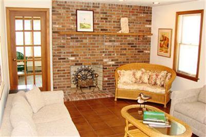 92 Harbor Road Hyannis, MA 02601 - Photo 7 of 22 a bedroom with a bed and a couch