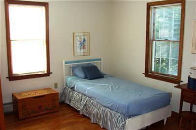 92 Harbor Road Hyannis, MA 02601 - Photo 10 of 22 a bedroom with a bed and window