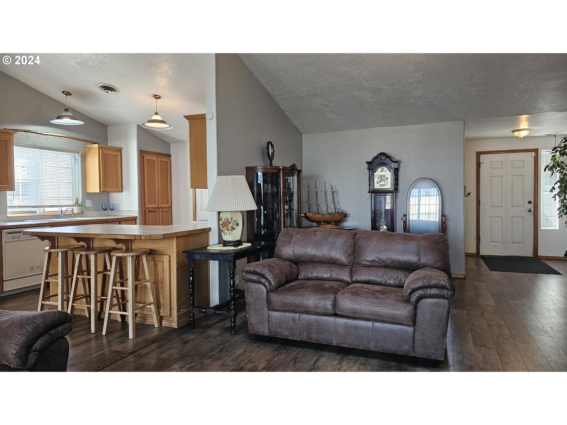 4072 Forsythia Street Springfield, OR 97478 - Photo 14 of 23 a living room with furniture and wooden floor