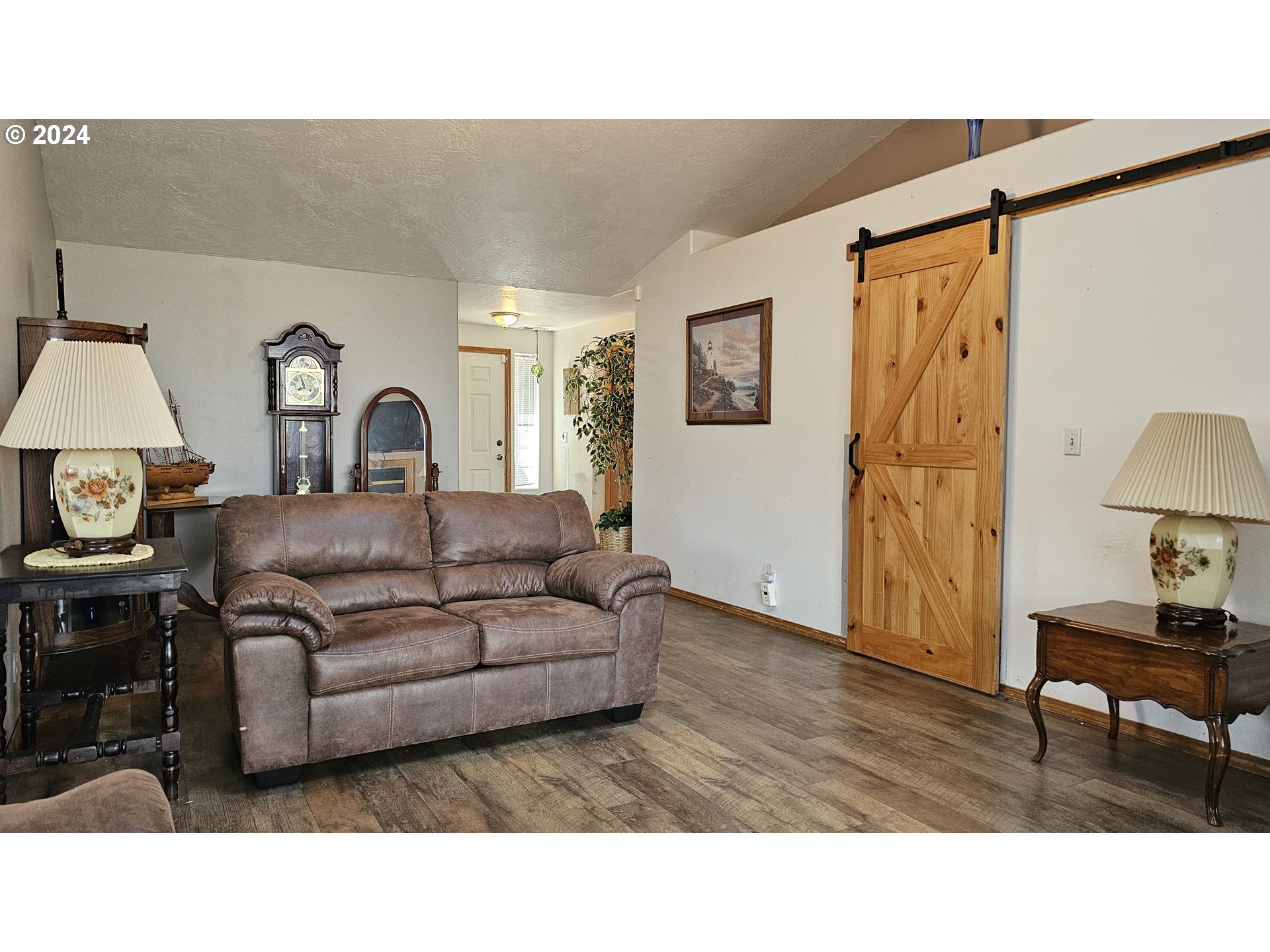 4072 Forsythia Street Springfield, OR 97478 - Photo 15 of 23 a living room with furniture and a table