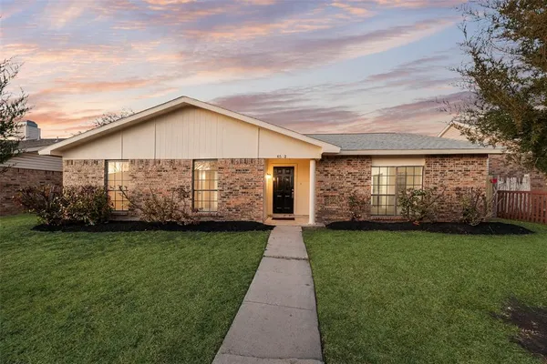 a view of a house with garden