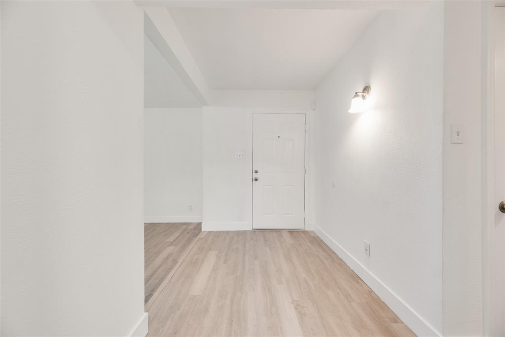 4512 Larner Street The Colony, TX 75056 - Photo 6 of 29 a view of wooden floor in a room