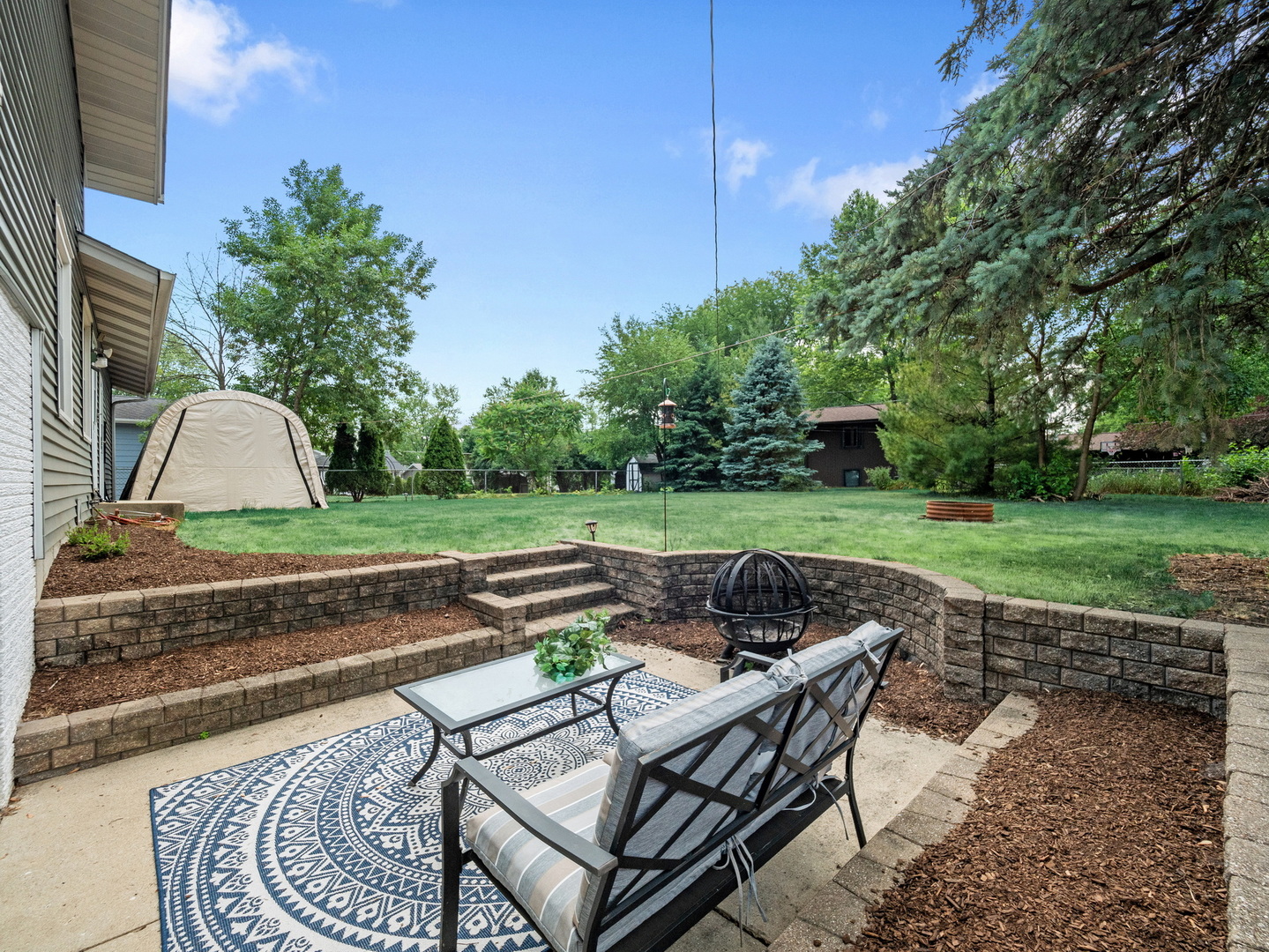 N208 Calvin Court Winfield, IL 60190 - Photo 24 of 30 a view of backyard with seating area and green space