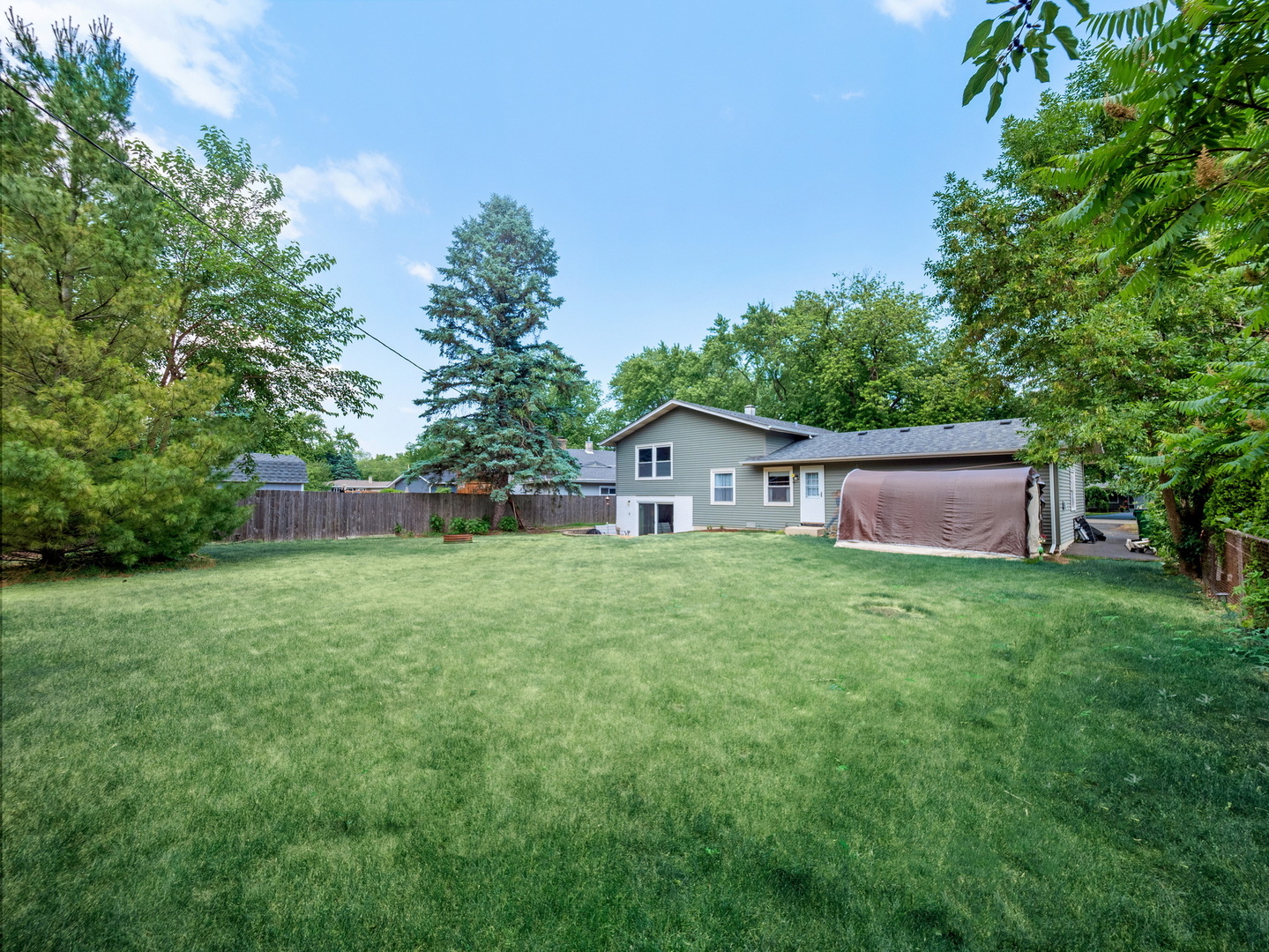 N208 Calvin Court Winfield, IL 60190 - Photo 27 of 30 a view of a house with backyard and garden