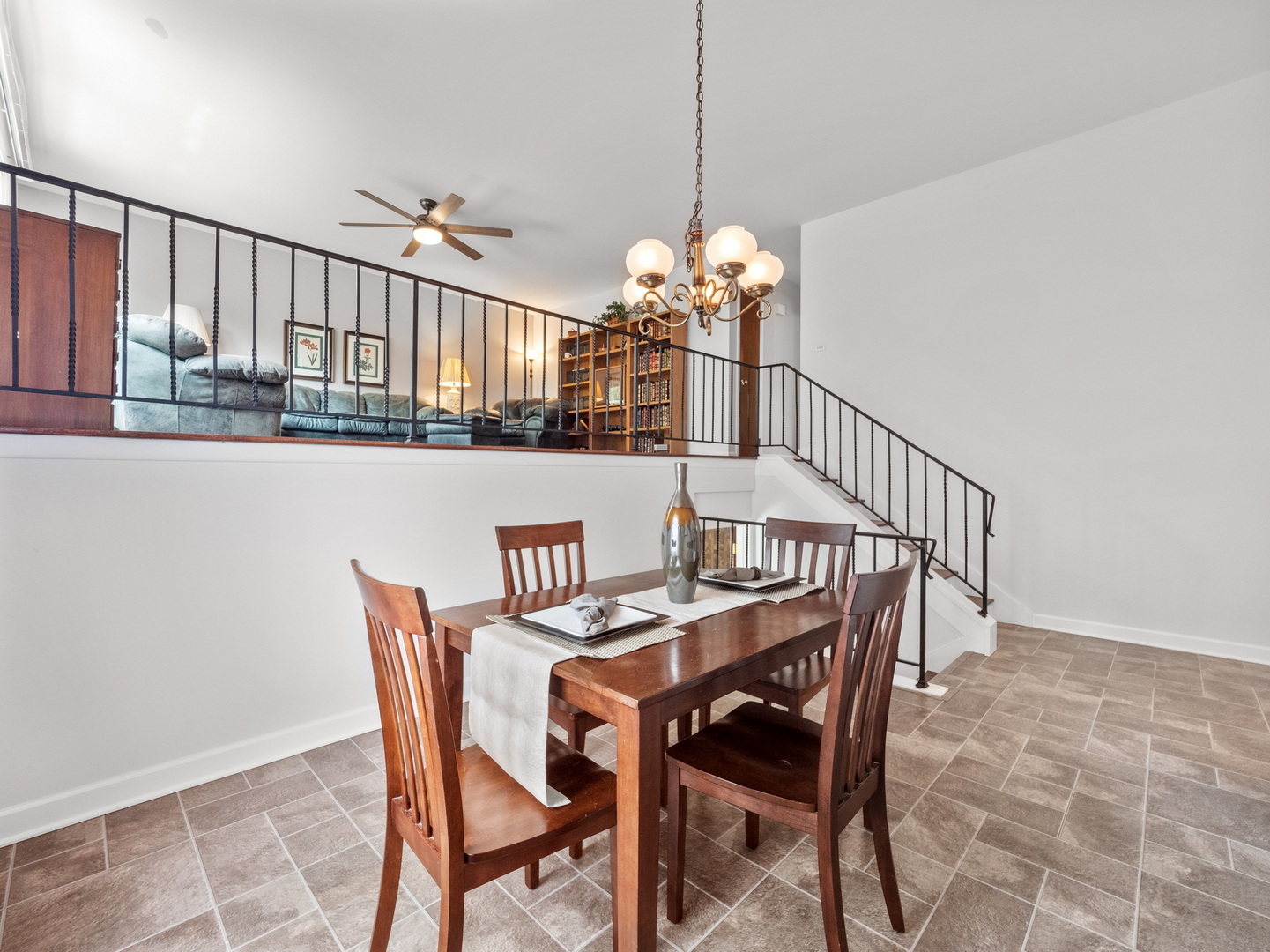 N208 Calvin Court Winfield, IL 60190 - Photo 9 of 30 a view of a dining room and chandelier