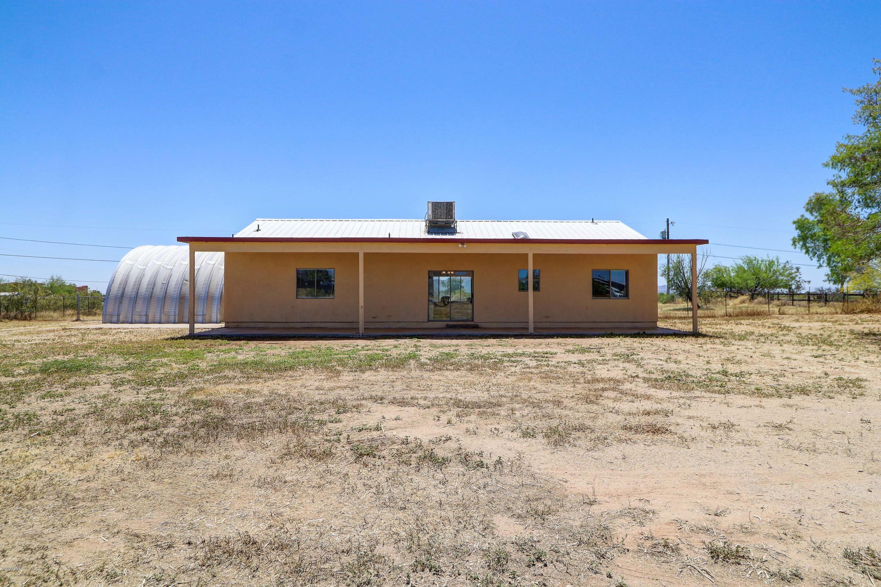 22540 Peak View Road Wittmann, AZ 85361 - Photo 26 of 33 Backyard_1