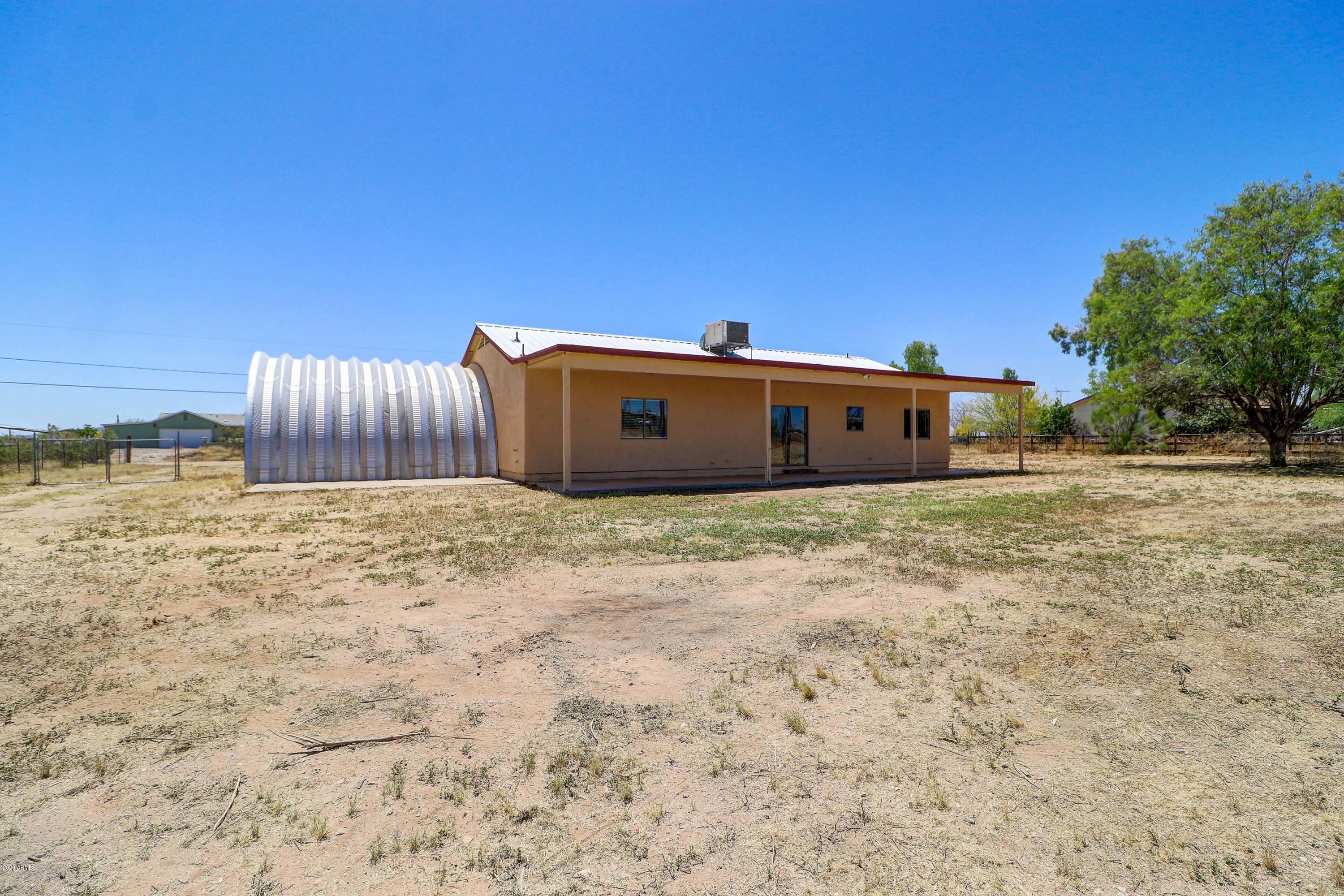 22540 Peak View Road Wittmann, AZ 85361 - Photo 27 of 33 Backyard_2