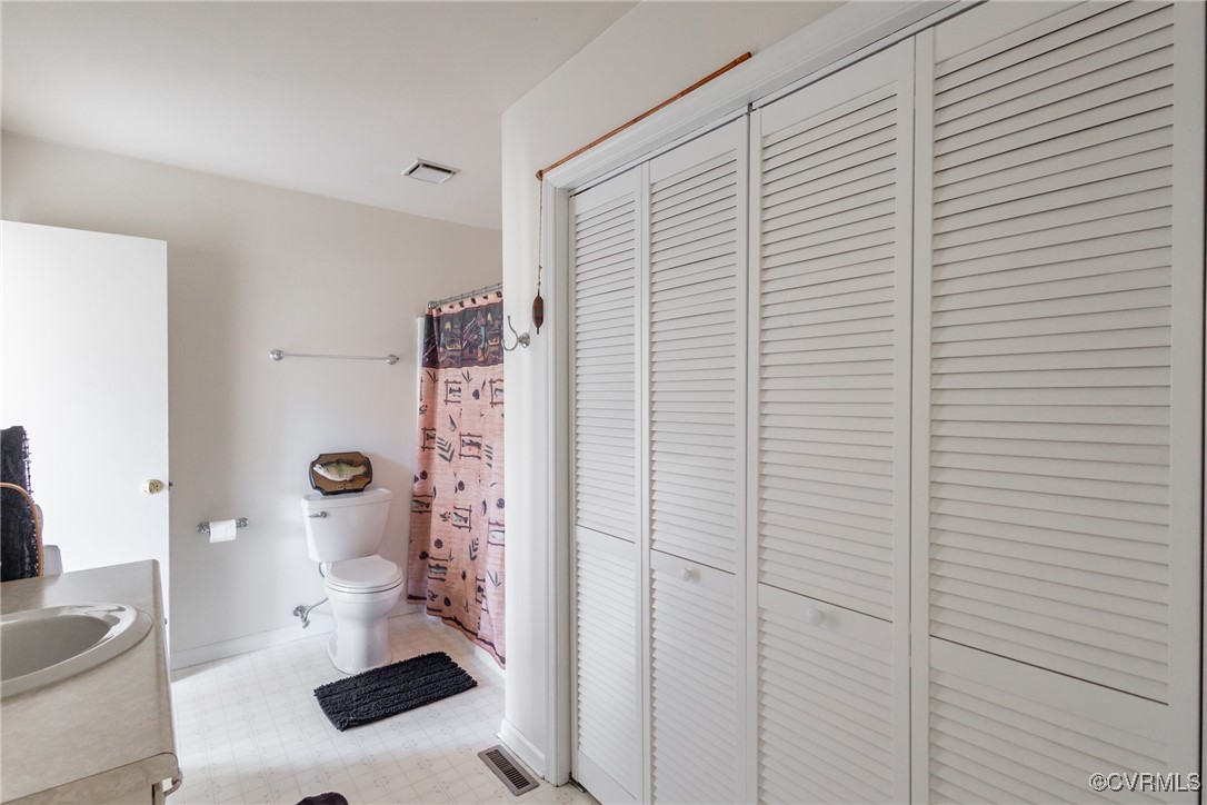 12901 Branders Bridge Road Chester, VA 23831 - Photo 15 of 28 a bathroom with a sink and a shower