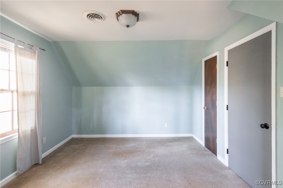 12901 Branders Bridge Road Chester, VA 23831 - Photo 22 of 28 an empty room with a empty space and windows