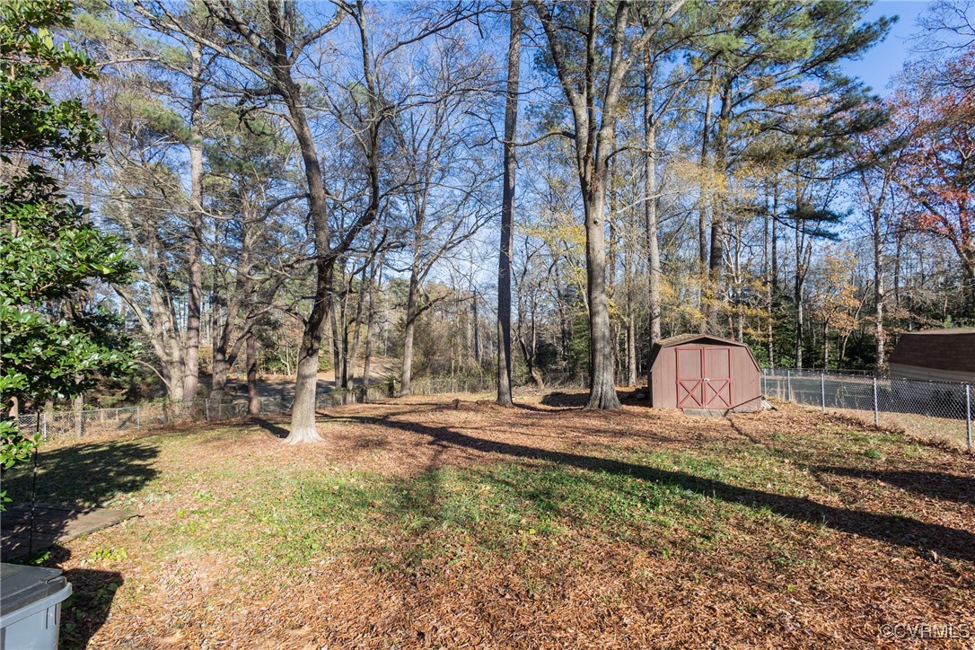 12901 Branders Bridge Road Chester, VA 23831 - Photo 26 of 28 a view of a yard with snow on the road