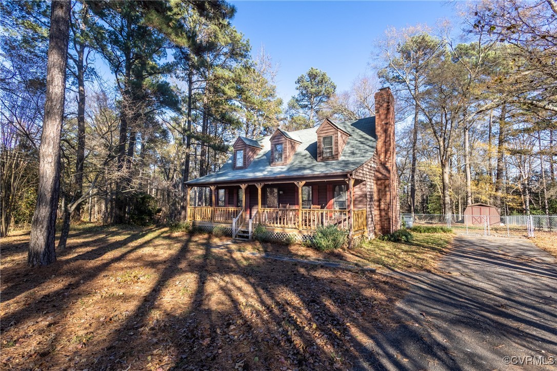 12901 Branders Bridge Road Chester, VA 23831 - Photo 3 of 28 a front view of a house with a yard