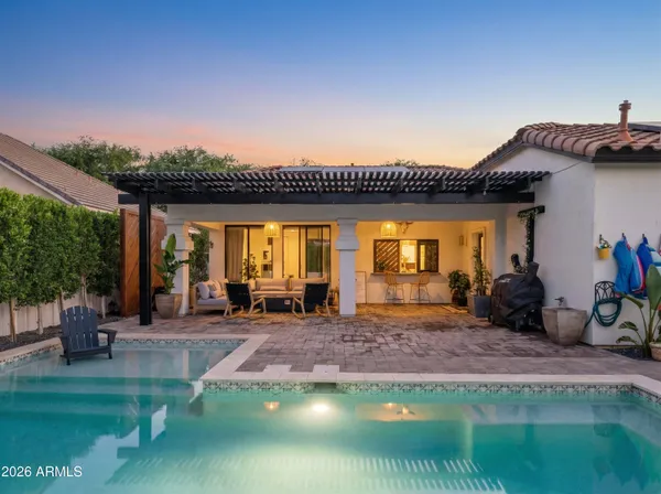 a view of outdoor space with green field and trees
