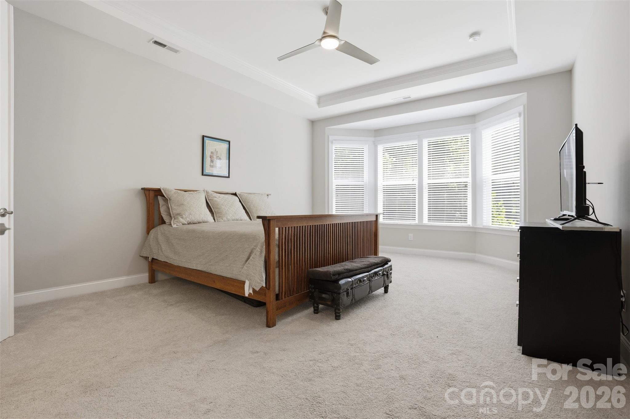 14022 Salem Ridge Road Huntersville, NC 28078 - Photo 15 of 38 a bedroom with a bed and wooden floor