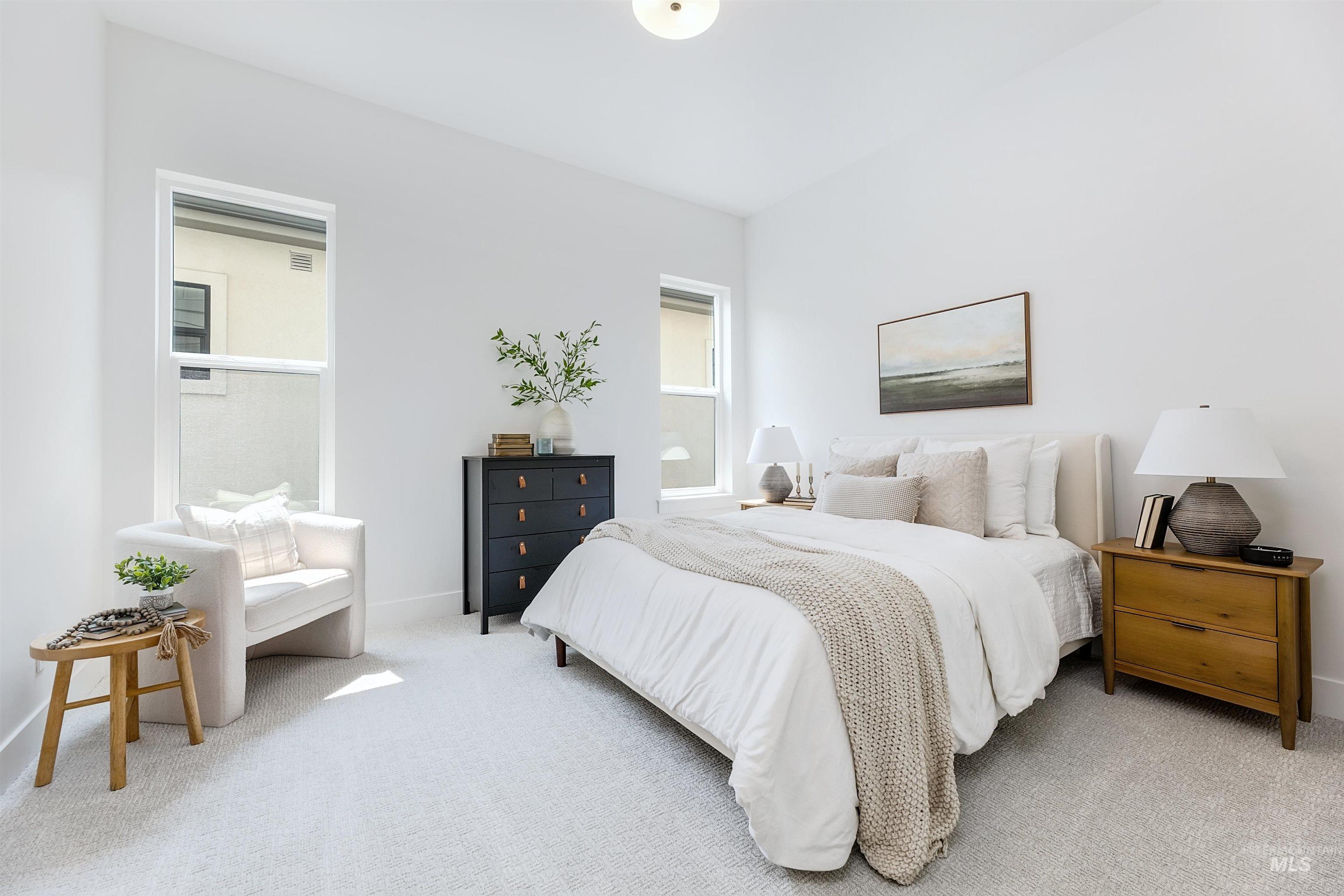 11468 South Saylis Place Kuna, ID 83634 - Photo 24 of 38 Bedroom featuring light carpet and baseboards