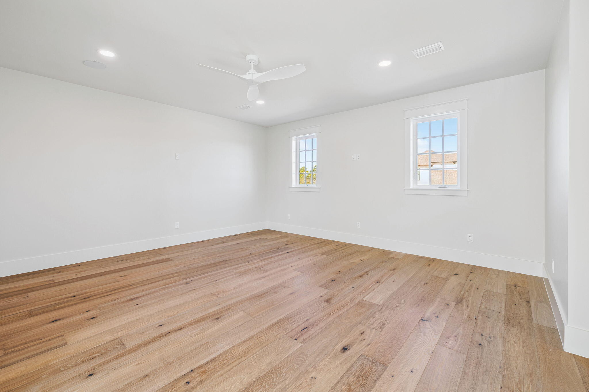 155 Golfridge Dr Inlet Beach Inlet Beach, FL 32461 - Photo 54 of 99 an empty room with wooden floor and windows