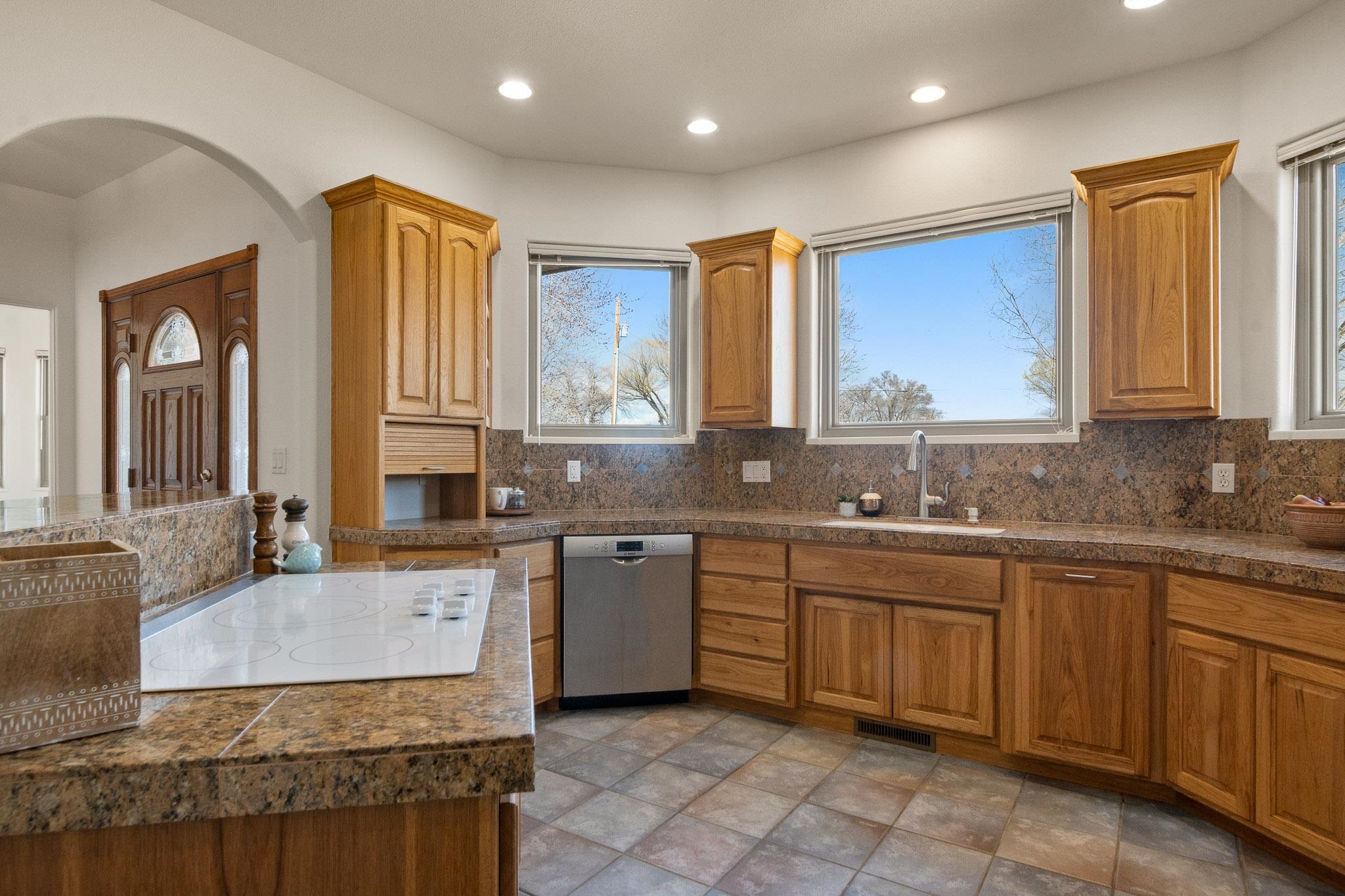 2107 I I- 1/2 Road Grand Junction, CO 81505 - Photo 10 of 42 a kitchen with a sink stove and cabinets