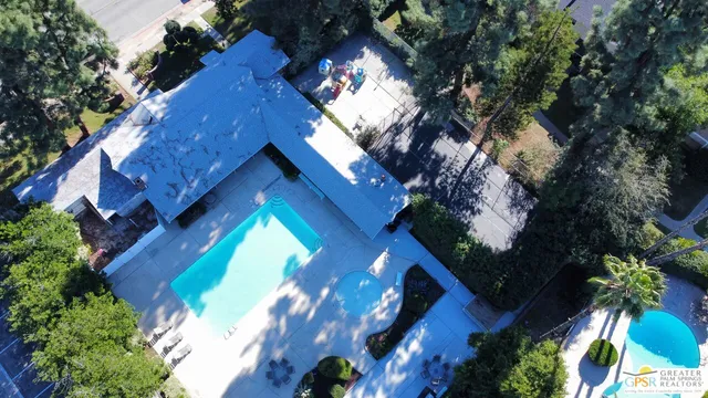 a view of a living room with a fireplace