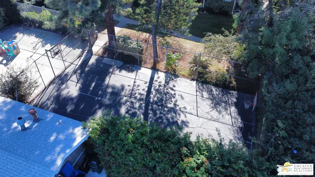 an aerial view of residential houses and city street