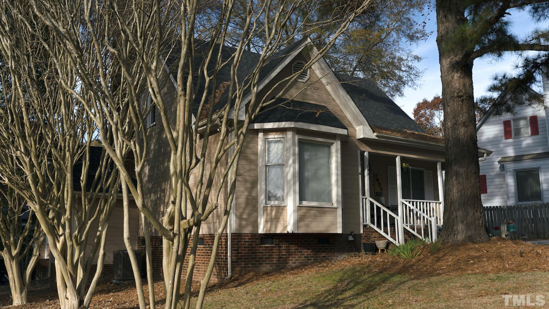7921 Mandrel Way Raleigh, NC 27616 - Photo 1 of 32 a front view of a house with a yard
